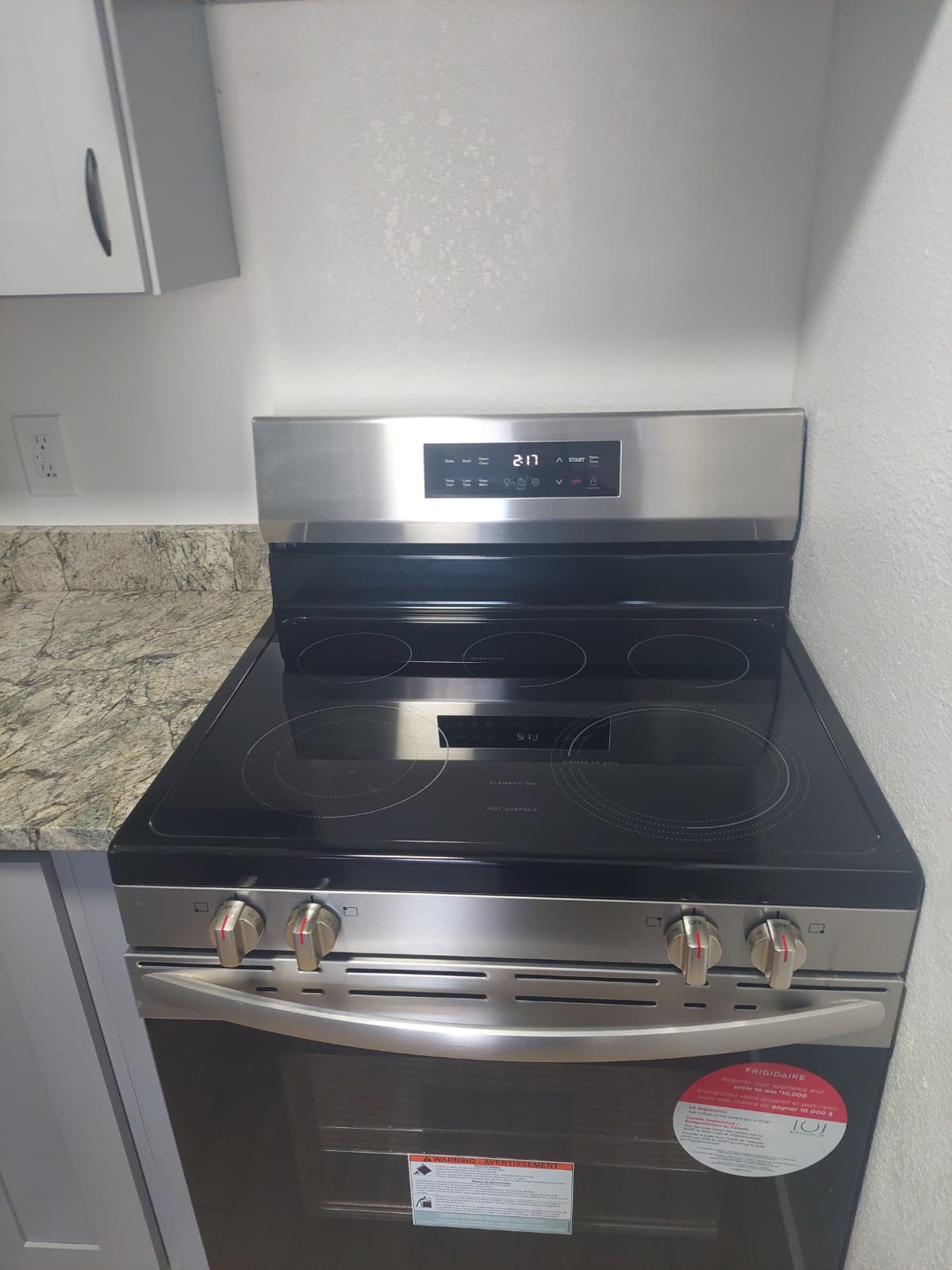 New stainless electric range