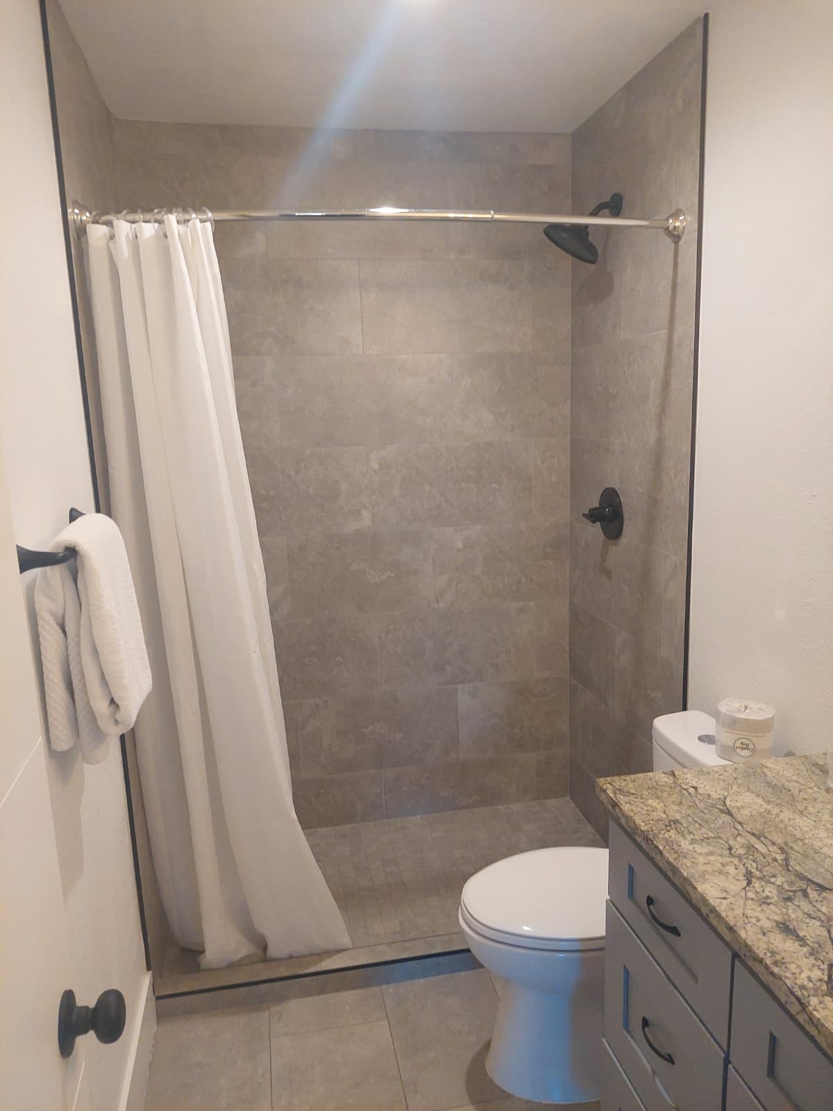 Remodeled tiled walk-in shower